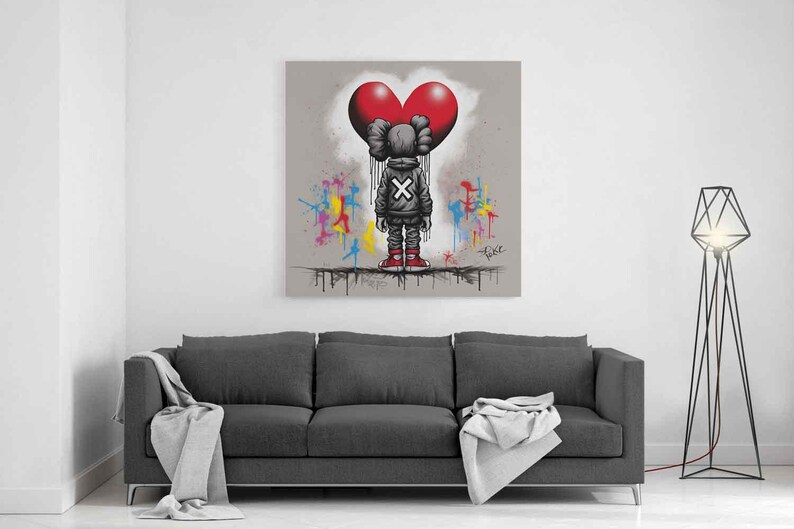 May Include: Urban street art canvas wall art featuring a graffiti-style character standing beneath a bold red heart, with X-marked details, paint drip effects, and colorful splashes on a neutral background, creating a modern love-themed wall decor ideal for a living room or bedroom.