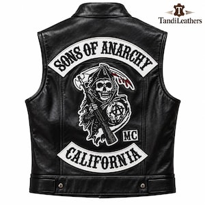 May include: A black leather waistcoat featuring a large embroidered patch on the back. The patch displays a grim reaper holding a rifle and a scythe, with the text Sons of Anarchy, California, and MC. The waistcoat has a collar and two metal snaps at the hem.