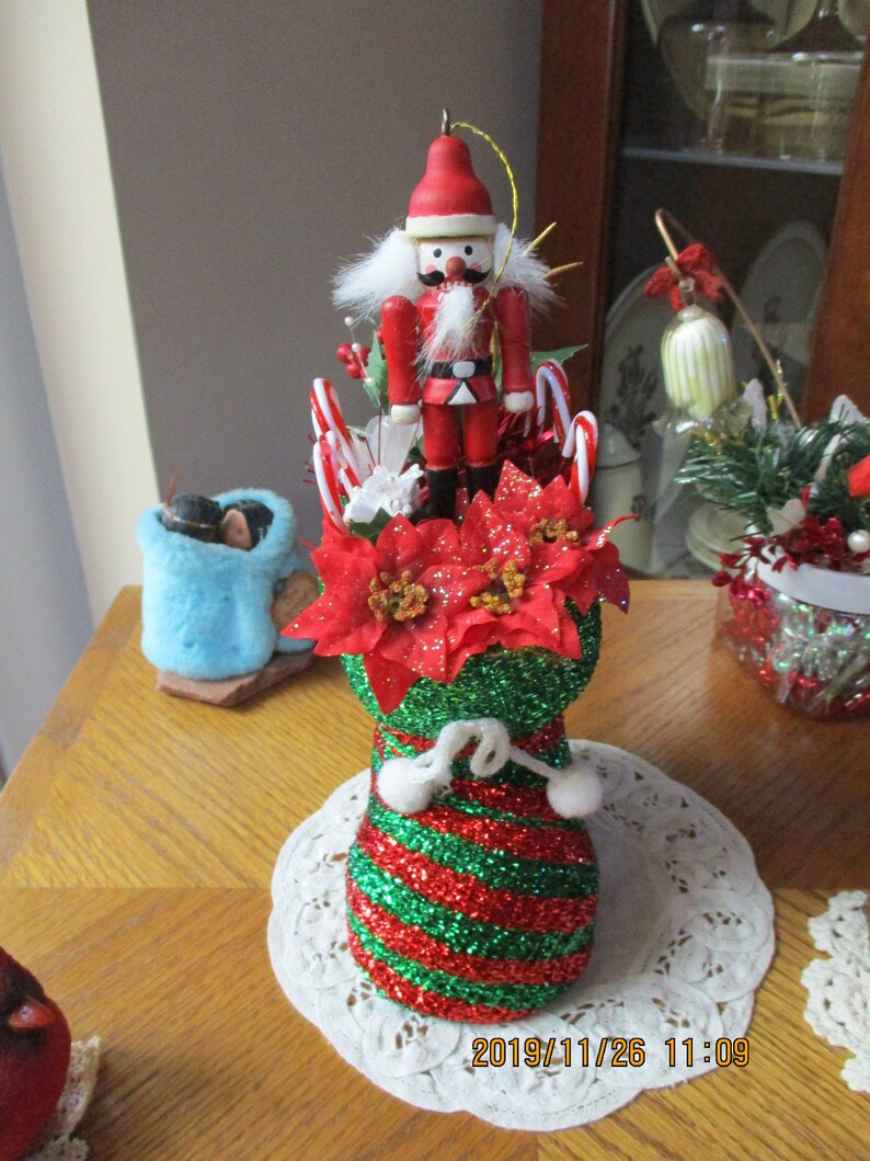 CHRISTMAS NUTCRACKER  Nestled in Santa's Green and Red image 0