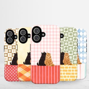 May include: Five rectangular phone cases featuring various patterns and cat illustrations. The designs include checkered, polka dot, striped, and floral motifs in pastel and vibrant colors, each displaying a black or orange cat sitting at the base.