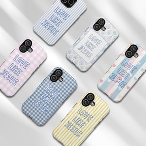May include: Six rectangular smartphone cases featuring the text LOVE LIKE JESUS in blue outline font. Designs include light blue stripes, a floral pattern, pink gingham, blue gingham, yellow stripes, and a blue striped background with small pink hearts.