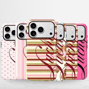 May include: A collection of six smartphone cases featuring various patterns including pink polka dots, vertical pink stripes, horizontal brown and gold stripes, a leopard print, and a solid pink background, all with the word Lucky in script.