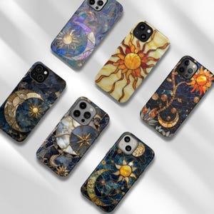 May include: Six smartphone cases featuring stained glass style designs of suns, moons, and stars. The cases display various color palettes including deep blues, warm yellows, and oranges, with intricate geometric patterns resembling mosaic art.