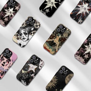 May include: A collection of nine smartphone cases featuring diverse graphic designs, including illustrations of celestial sun and moon faces, a harlequin figure, a vintage-style character, and various star patterns in black, white, and muted color palettes.