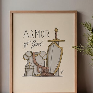 Pode incluir: Uma impressão emoldurada com uma ilustração desenhada à mão de uma armadura, incluindo um capacete, peitoral, botas, escudo e espada. As palavras "ARMOR of God" são escritas acima da ilustração em uma fonte manuscrita. A obra de arte está em um fundo bege.