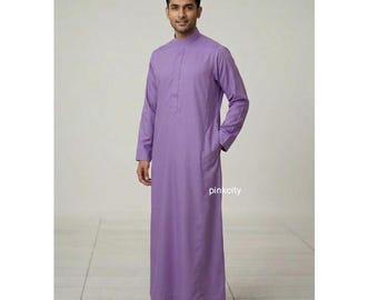 May include: A long, lavender-colored robe with a mandarin collar and long sleeves. The robe has a pocket on the right side and is floor-length. The text "pinkcity" is visible on the lower right side of the robe.