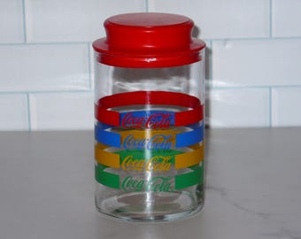 Vintage 1980's Coca-Cola Striped Colorful Glass Canister Jar with Red Plastic Lid Coke Collectible
