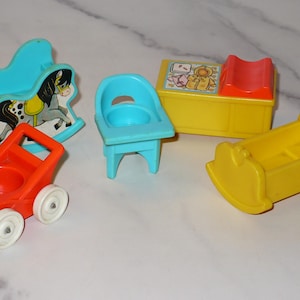 May include: A collection of vintage toy furniture in bright colors. Includes a blue rocking horse, a red lawnmower, a blue high chair, a yellow dresser with a red top, and a yellow rocking cradle.