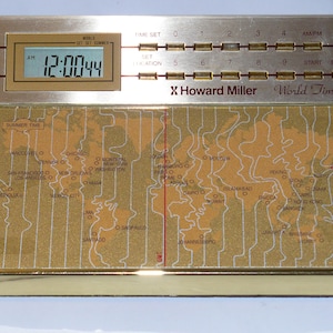 Howard Miller Discover Time World Time Desk Clock With