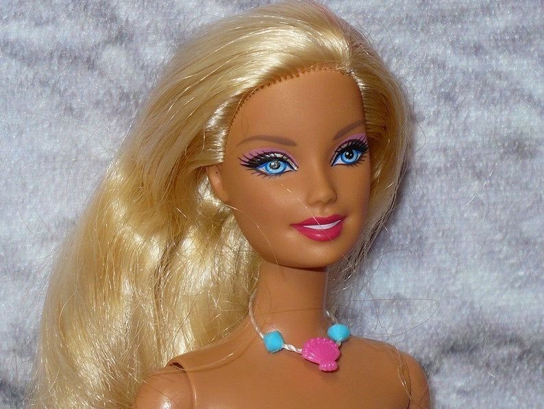 barbie with pink streak in hair
