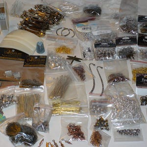 Huge Lot of Jewelry Making Findings Bead Caps Pins Jump Rings Ear Wires Barrettes Wire Bead Caps Chain Toggles