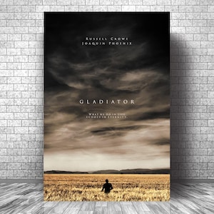 May include: A film poster for "Gladiator" with a dark, cloudy sky and a person in a wheat field. The names Russell Crowe and Joaquin Phoenix are at the top. The film's title and tagline are also visible.