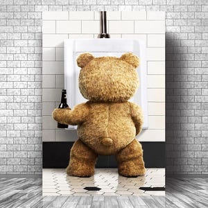 May include: A poster featuring a brown teddy bear standing in front of a urinal, holding a dark bottle. The bear is in a bathroom setting with white tile walls and a black and white tiled floor. The image has a humorous theme.