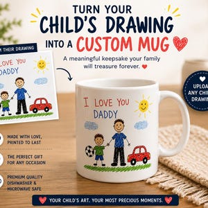 May include: A white ceramic mug featuring a colorful child's drawing of two people, a soccer ball, a red car, a yellow sun, and blue clouds. The text "I LOVE YOU DADDY" is printed in red and blue. The mug is displayed with a copy of the original drawing.