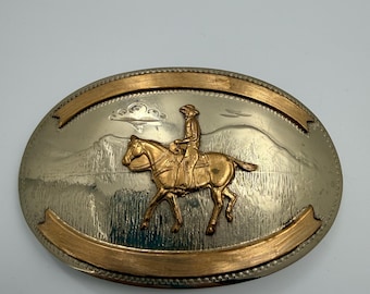 Vintage Comstock Silversmiths Duitse zilveren tweekleurige westernriemgesp: scène cowboy te paard
