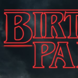 May include: Red neon sign with the words "BIRTHDAY PAL" against a dark cloudy background.