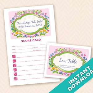 Peut inclure: Carte de score et instructions de jeu imprimables pour un jeu de Bunco. La carte de score est rose avec une bordure florale et comporte des espaces pour le nom, les victoires, les défaites, les buncos et les mini buncos. Les instructions du jeu sont sur une carte rose avec une bordure florale et disent "Low Table" et "Les gagnants avancent à la table du milieu, l'équipe perdante reste."