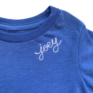 Youth Monogrammed Crew Neck T-Shirt. Girls Custom Embroidered Shirt with Personalized Cursive Name. Kids Sweatshirt Custom