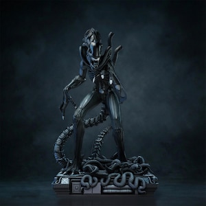 May include: A dark gray Alien figure, standing on a base with a complex, textured design. The creature has a skeletal head, elongated limbs, and a long, segmented tail. The figure is a detailed representation of the iconic movie monster.