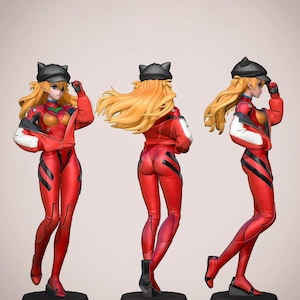 May include: A figurine of a character in a red jumpsuit with black accents, a black hat, and blonde hair. The figure is posed in three different stances on a black base. The jumpsuit has a red and white jacket.