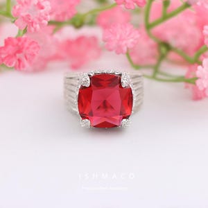 May include: A set of three ceramic mugs with a speckled, matte finish. The mugs are in shades of cream, light gray, and dark gray. Each mug has a simple, minimalist design, perfect for coffee or tea.