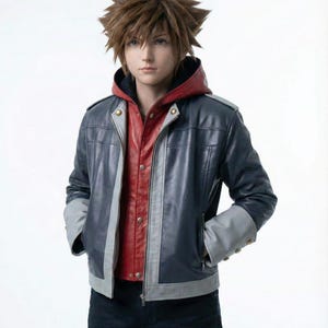 May include: A blue and gray leather jacket with a red hooded shirt underneath. The jacket has gray accents and a zipper closure. The person is wearing dark blue jeans.