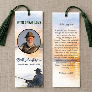 May include: Two rectangular bookmarks with green tassels. One bookmark features a portrait of a man in a hat, the text "WITH GREAT LOVE," and the name and dates "Bill Anderson, June 15, 1946 - April 3, 2028." The other bookmark has text about Bill's legacy.