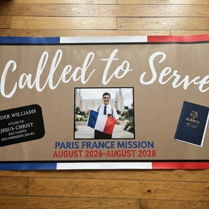 May include: A rectangular banner with a tan background and a border featuring blue, white, and red stripes. The text reads Called to Serve, Elder Williams, Eglise de Jesus-Christ des Saints des Derniers Jours, Paris France Mission, August 2026-August 2028. It includes a photo of a person holding a French flag and an image of The Book of Mormon.