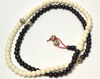 108 bead Buddhist prayer mala in black & white bone M270