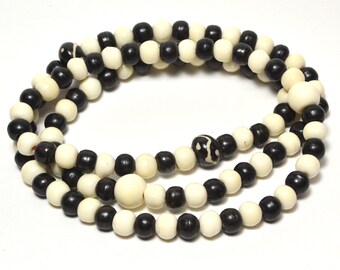 108 bead Buddhist prayer mala in black & white bone M266