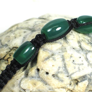 Three jade beads on this knotted cord bracelet by Nicole Wong NW220