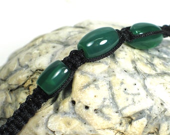 Three jade beads on this knotted cord bracelet by Nicole Wong NW220