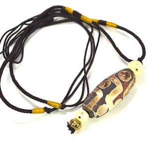 Rustic nine eye Tibetan dzi bead  DZB2244