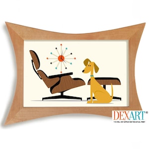 May include: A framed print featuring a mid-century modern design. The artwork depicts a brown chair, a dog, a side table, and a starburst clock. The frame is made of light-colored wood. The print has the text "DEXART".