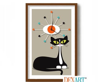 May include: A black and white cat with yellow eyes sits in front of a mid-century modern clock with orange and blue accents. The clock is a stylized eye with spokes radiating out from the centre.
