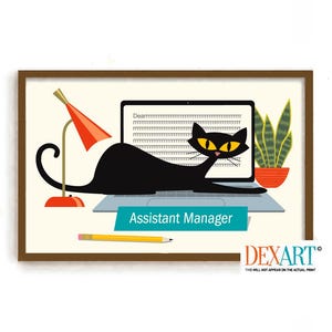 May include: A framed print featuring a black cat lounging on a laptop with the text "Assistant Manager." A desk lamp and a potted plant are also visible. The cat has yellow eyes and is set against a cream background.