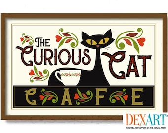 May include: A framed print with a black cat and a teacup, with the text "The Curious Cat Cafe" in a vintage style font.