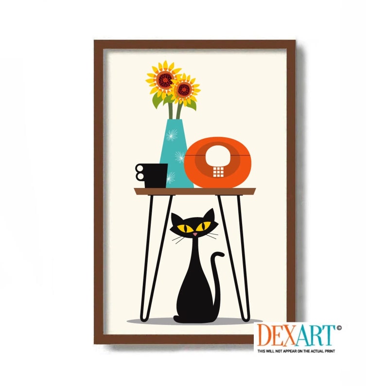 May include: A framed art print featuring a stylized mid-century modern design. A black cat with yellow eyes sits beneath a table holding a teal vase with sunflowers, a black mug, and an orange decorative object. The print has a brown frame.