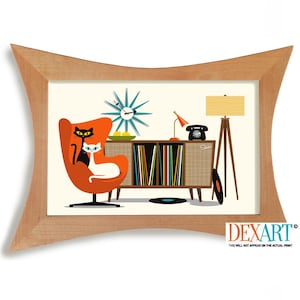 May include: A framed print featuring a mid-century modern interior scene. The artwork includes an orange chair with two stylized cats, a record cabinet, a starburst clock, and a floor lamp. The color palette includes orange, black, white, and teal.