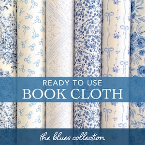 May include: Six rolls of book cloth featuring various blue and white patterns, including floral motifs, ribbons, and intricate lace-like designs. The text READY TO USE BOOK CLOTH and the blues collection is overlaid on the image.