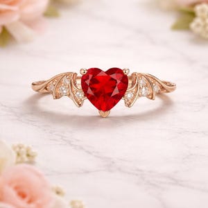 May include: A rustic wooden sign with the text "Welcome to our home" in white lettering. The sign features a distressed finish and a simple, inviting design, perfect for front door decor.