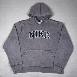 Sudadera con capucha Nike Spellout con logo de arco bordado, color gris jaspeado, talla XL para hombre. imagen 1