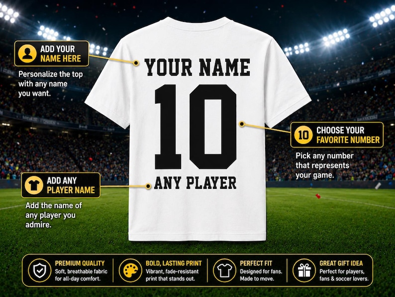 May include: White t-shirt with black text and numbers, featuring "YOUR NAME" above the number "10" and "ANY PLAYER" below. The shirt design allows for personalization of name and number. The shirt is displayed on a green field.
