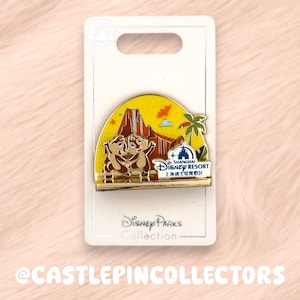 May include: A white ceramic mug with a black handle and the text "But First, Coffee" in a bold, black font. The mug is set against a neutral background, highlighting its simple design.