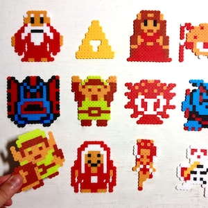 Legend of Zelda Retro Video Game Art. Perler Bead 8 bit Pixel Sprites. NES Magnets. Link, Old Man, Octoroc, Triforce, Moblin