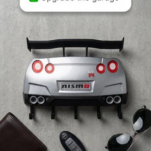 May include: A rustic wooden sign with the text "Welcome to our home" in white lettering. The sign features a distressed finish and a simple, inviting design, perfect for a front porch or entryway.