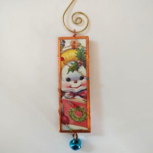 Snowman (Girl) Glass Christmas Ornament