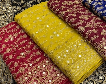 Chal dupatta de diseño tradicional bordado a mano con elaborados adornos.