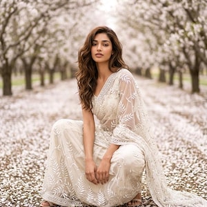 May include: A set of three ceramic mugs with a speckled, matte finish. The mugs are in shades of cream, light gray, and dark gray. Each mug has a simple, minimalist design, perfect for coffee or tea.