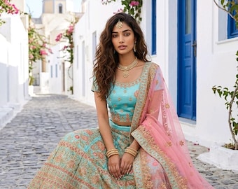 Lehenga Choli de boda de diseñador, sin coser, en seda satinada azul claro y rosa.